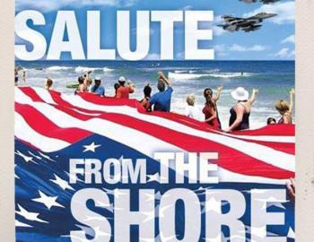 People saluting air force from the shores