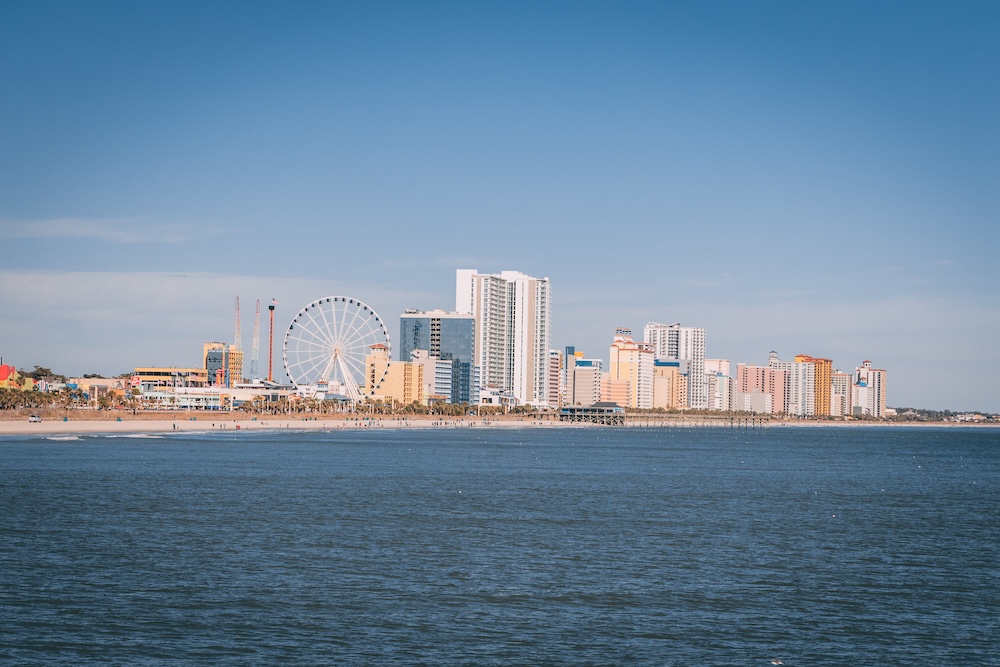 skyline of myrtle beach viewed from dock